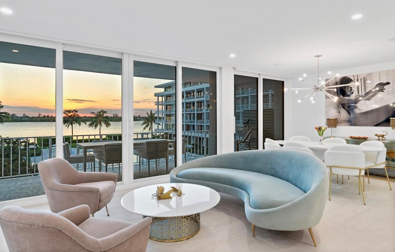 BRAND NEW MODERN RENOVATION! Stunning 3-Bed/3-Bath w/ Direct Intracoastal water views from all living areas and primary suite. Featuring a beautiful open kitchen with Thermador appliances, large wine fridge and white custom cabinets; spacious walk-in closets; motorized blackouts & privacy shades; white trimmed impact glass; and an expansive 40-ft wraparound terrace perfect for al fresco dining. The 3rd bedroom has a built-in queen murphy bed. Gorgeous renovated poolside cabana available separately. Deeded beach access with lounge chairs & umbrella service exclusively for residents at The Cove. The East building at the Cove has 15 residences(only 3 apts per floor)with its own doorman, mail room, and lobby. This amazing hidden private oasis boosts a chic 75-foot swimming pool, designed by
