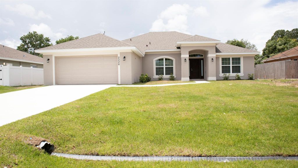 Photo of 2226 SE Haddon Street, Port Saint Lucie, FL 34984 (MLS # R10951244)