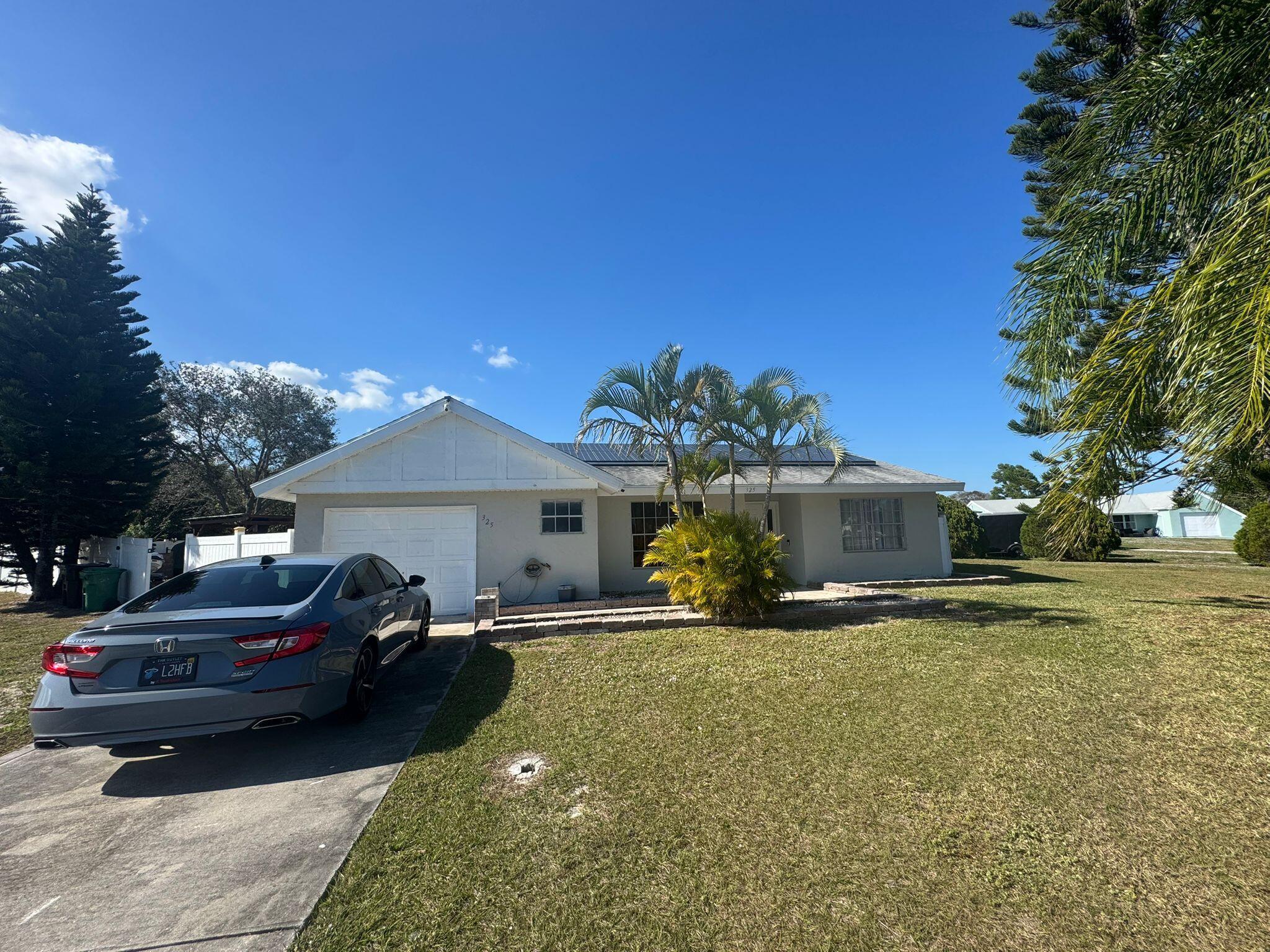 Fantastic opportunity to purchase this renovated home, situated on an oversized .33 acre lot.. Updated kitchen, updated bathrooms, and generously sized bedrooms.. Screened in pool, along with an outdoor space large enough to entertain any party, or to let the kids run and play.