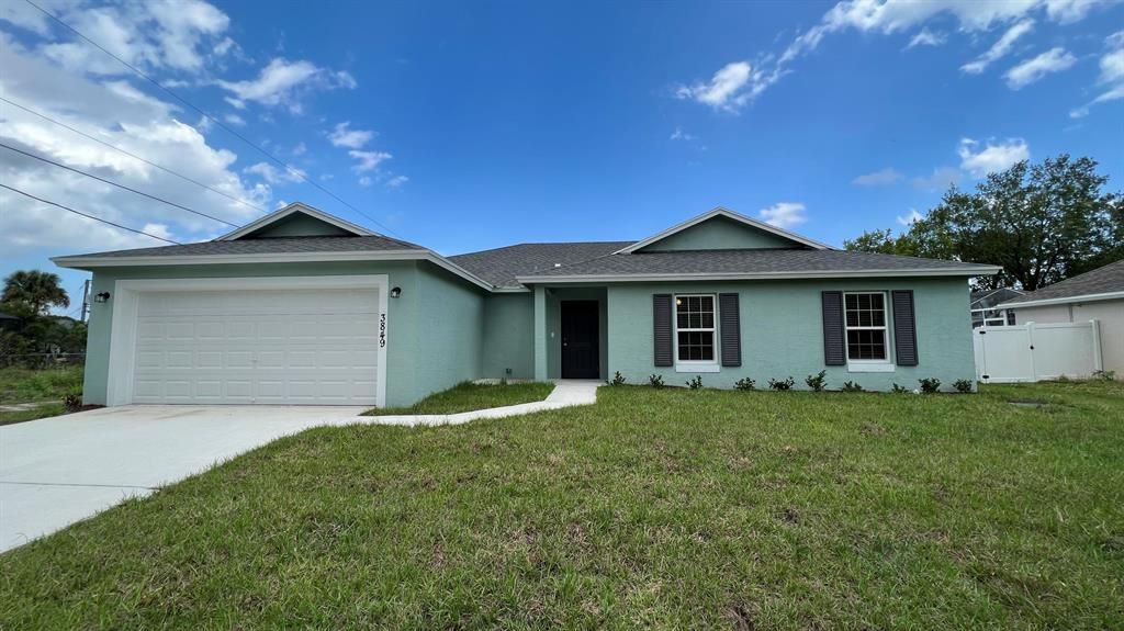 Photo of 3849 SW Laidlow Street, Port Saint Lucie, FL 34953 (MLS # R10820906)