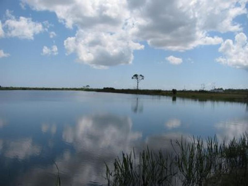 Photo of 6351 SW Pentalago Circle, Palm City, FL 34990 (MLS # R11128029)