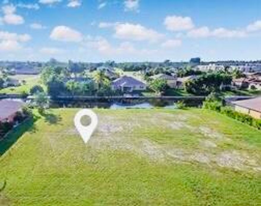 Prime canal-front lot in Southwest Cape Coral with an existing seawall installed in 2014. Located on a street with established homes and new construction, this property offers a fantastic opportunity to build a custom waterfront residence or investment property. Conveniently located near shopping, dining, and boating access. Zoning R1-W