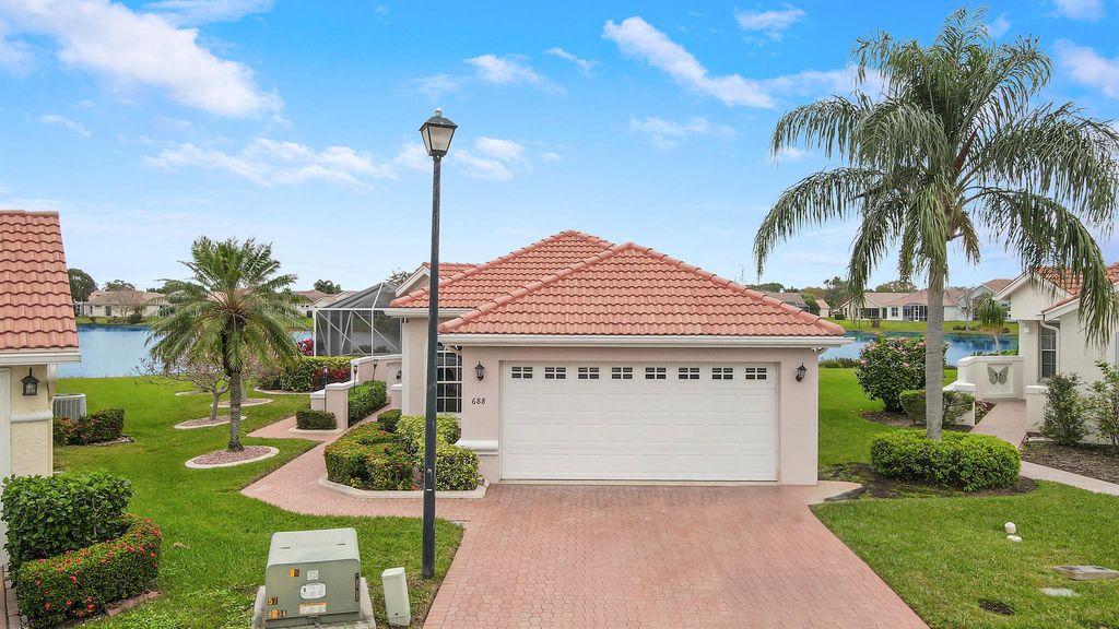 Photo of 688 SW Treasure Cove, Port Saint Lucie, FL 34986 (MLS # R10951356)