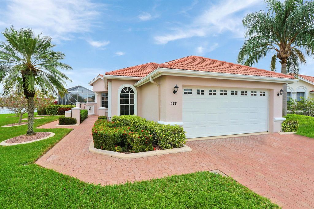 Photo of 688 SW Treasure Cove, Port Saint Lucie, FL 34986 (MLS # R10951356)