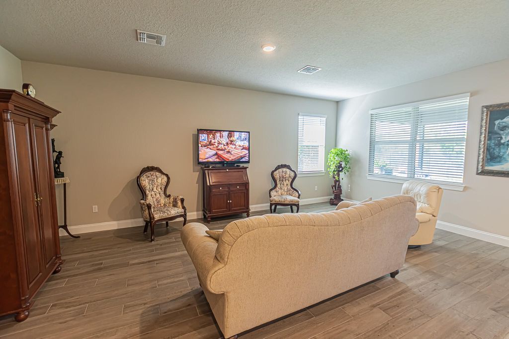 Photo of 8993 Dahlia Circle, Port Saint Lucie, FL 34986 (MLS # B26007206)
