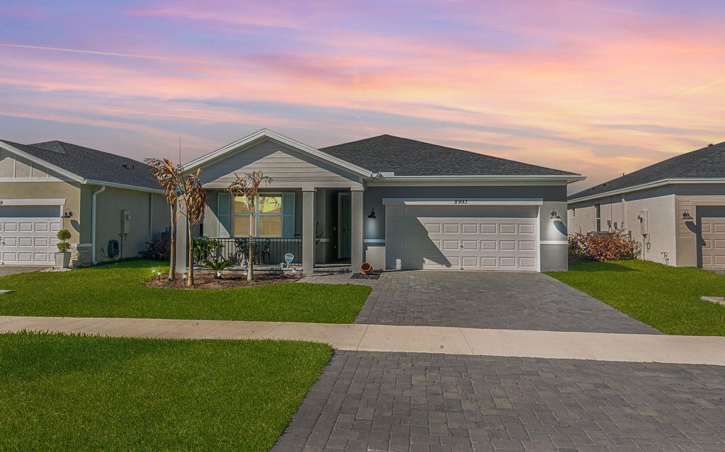 Photo of 8993 Dahlia Circle, Port Saint Lucie, FL 34986 (MLS # B26007206)