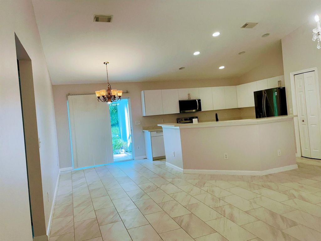 Photo of 2333 SW Wynnewood Street, Port Saint Lucie, FL 34953 (MLS # R11119880)