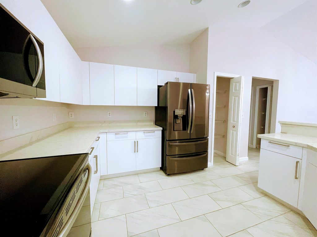 Photo of 2333 SW Wynnewood Street, Port Saint Lucie, FL 34953 (MLS # R11119880)