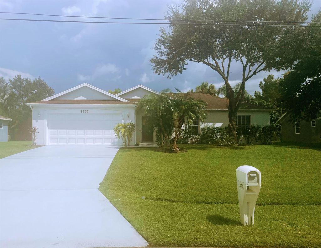 Photo of 2333 SW Wynnewood Street, Port Saint Lucie, FL 34953 (MLS # R11119880)