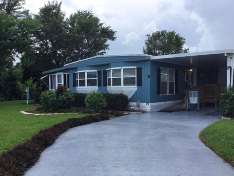 Photo of 8 Santa Fe Lane, Port Saint Lucie, FL 34952 (MLS # B26075596)