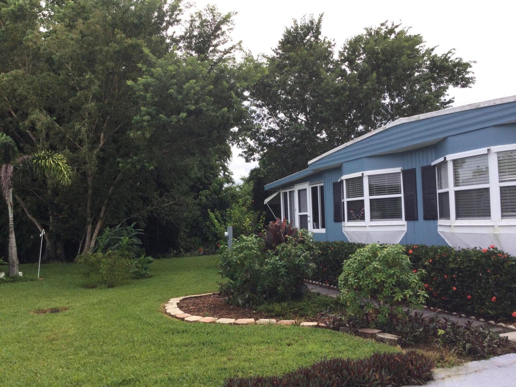 Photo of 8 Santa Fe Lane, Port Saint Lucie, FL 34952 (MLS # B26075596)