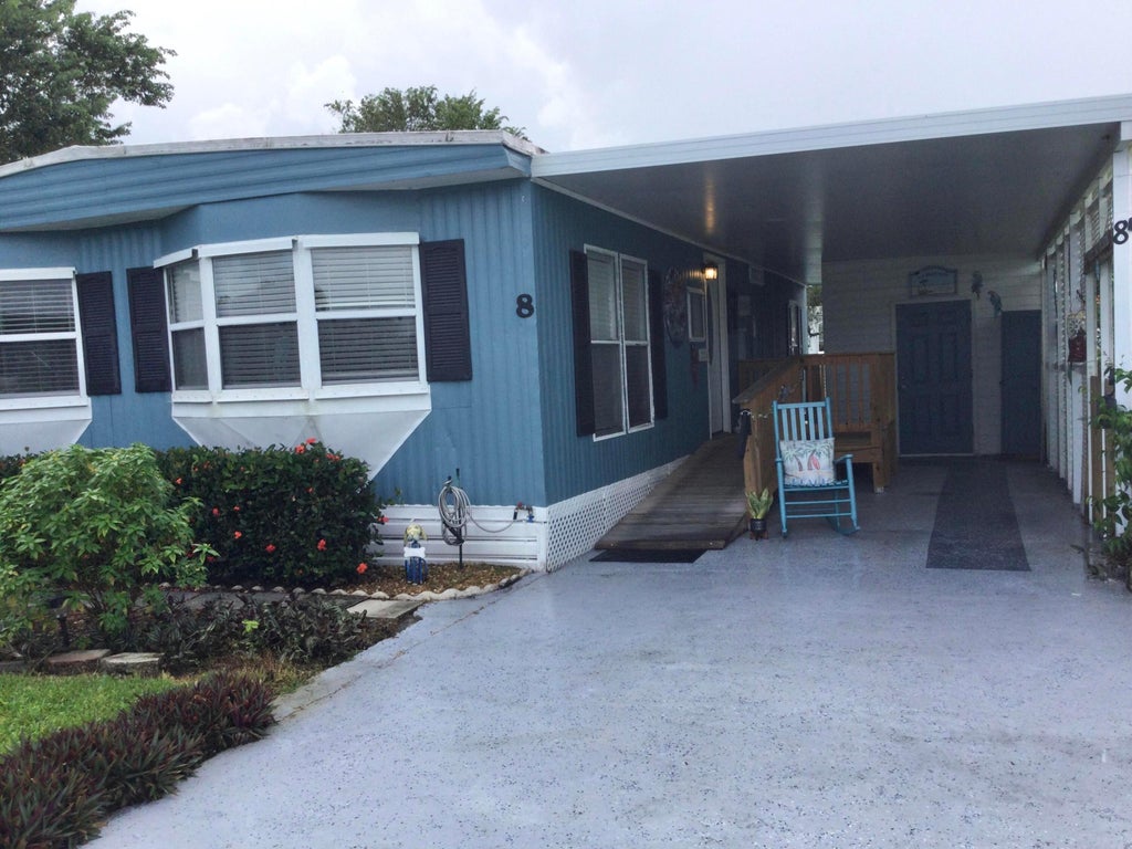 Photo of 8 Santa Fe Lane, Port Saint Lucie, FL 34952 (MLS # B26075596)