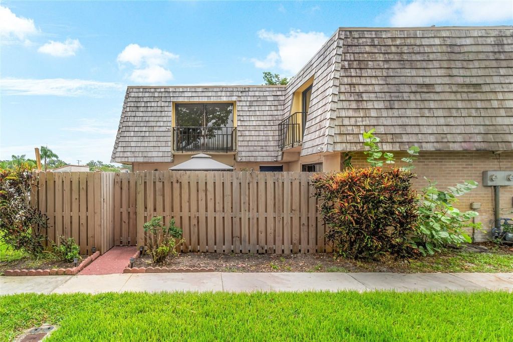 Photo of 216 Lake Arbor Drive, Palm Springs, FL 33461 (MLS # F10456754)