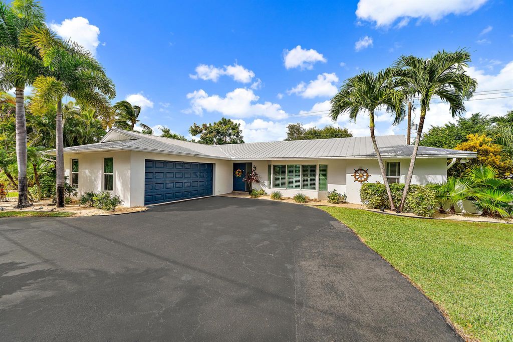 Photo of 298 Country Club Drive, Tequesta, FL 33469 (MLS # R10933848)