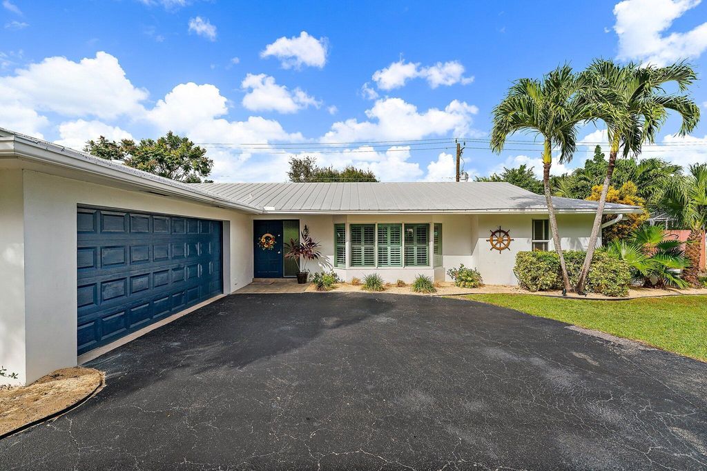 Photo of 298 Country Club Drive, Tequesta, FL 33469 (MLS # R10933848)