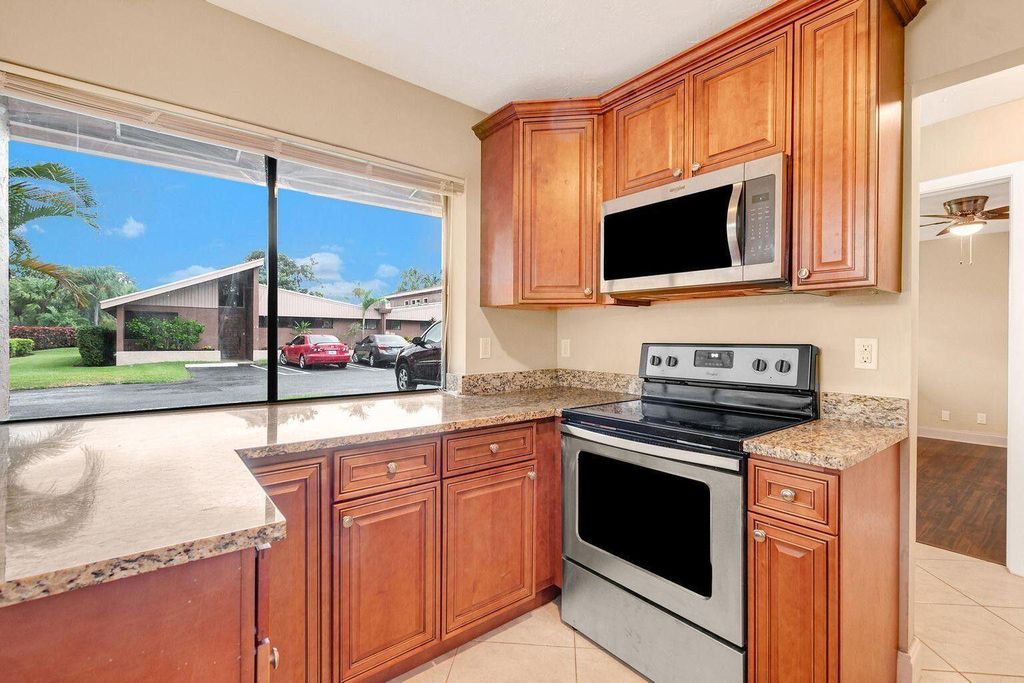 Photo of 166 Sparrow Drive #1b, Royal Palm Beach, FL 33411 (MLS # R11127322)