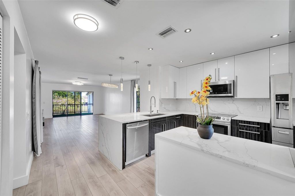 Photo of 21338 Juego Circle #11B, Boca Raton, FL 33433 (MLS # F10498580)