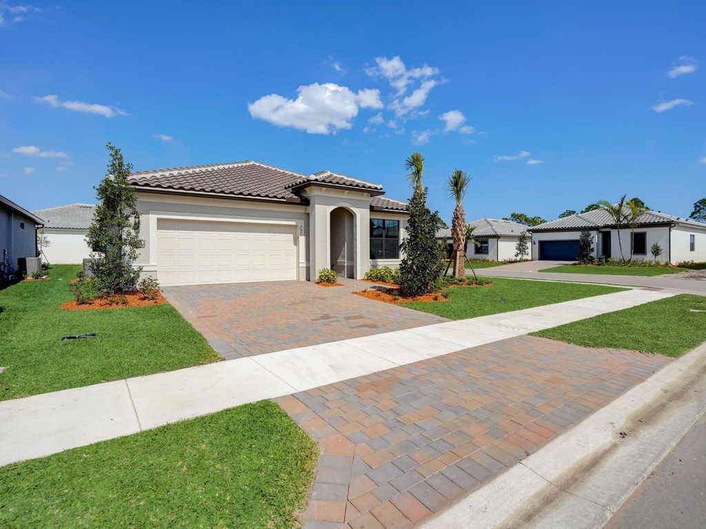 Photo of 757 SE Courances Drive, Port Saint Lucie, FL 34984 (MLS # R10964929)