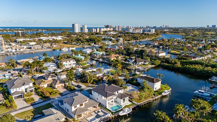 Brand new waterfront construction in the heart of Palm Beach Gardens offering the perfect blend of luxury and functionality. Designed with a thoughtful, open layout, this residence features 5 en-suite bedrooms, a private office, loft, elevator, and dual laundry rooms for ultimate convenience. Enjoy true boating lifestyle with direct Intracoastal access with no fixed bridges, dockage for up to a 60' yacht, and quick access to the Palm Beach Inlet. Quality craftsmanship shines through with premium finishes throughout. A collector-ready 3-car garage with lift capability accommodates up to 6 vehicles. Rare county-only property taxes! Just minutes from world-class dining, golf, shopping, and beaches; this is South Florida waterfront living at its finest.