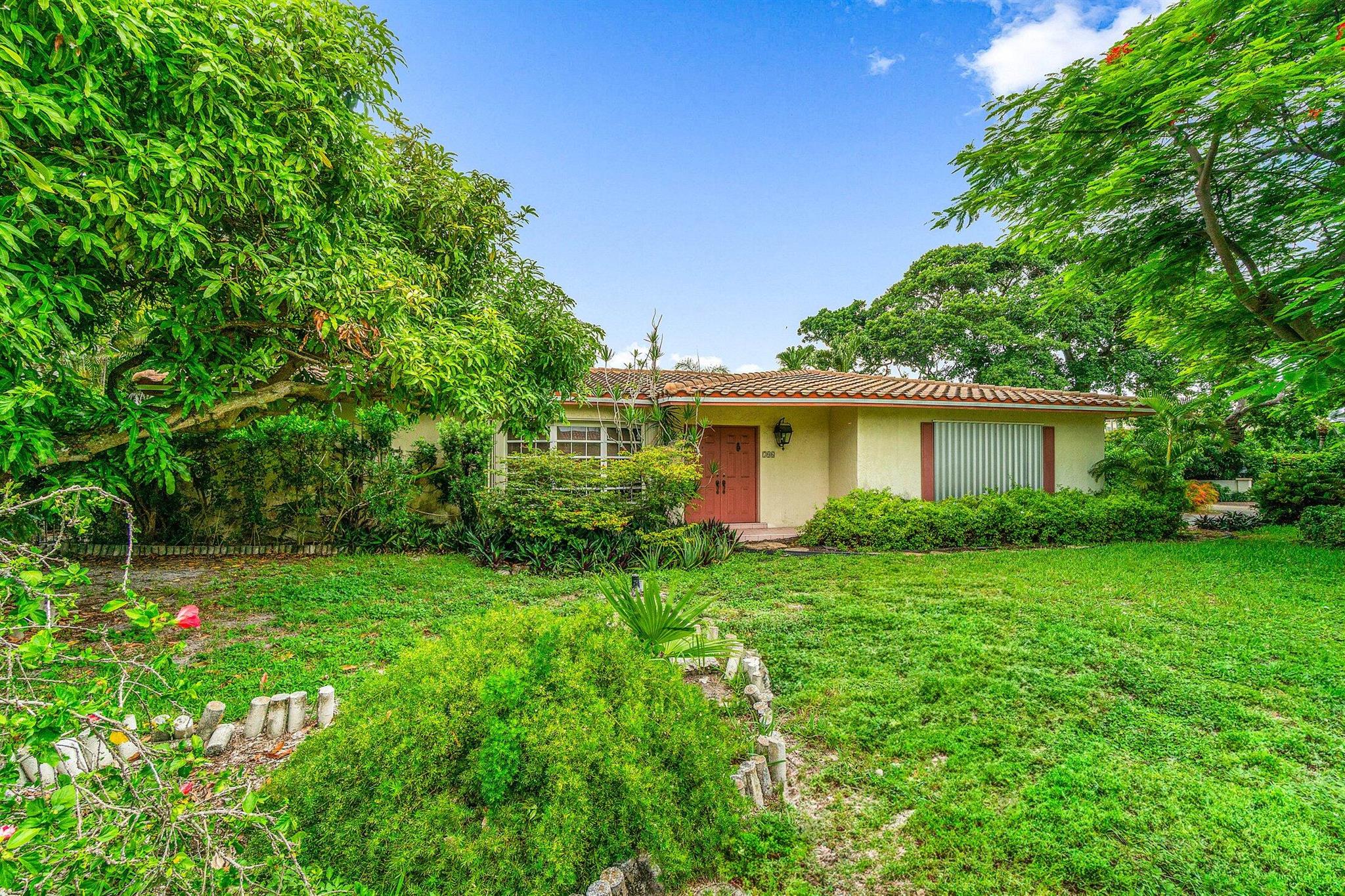Build or renovate the existing home on this 9718 square foot corner lot directly across the street from the intracoastal, in Sun and Surf. The Sun and Surf community is a quiet, established neighborhood in East Boca Raton between the ocean and the intracoastal with beautiful multi-million dollar estates, making it one of the most coveted areas in Boca. It is a short walk from the Atlantic Ocean, and mere minutes from The Boca Raton resort, as well as top-tier golf courses, fine dining, shopping in downtown Boca, and of course, the easygoing beach lifestyle.A rare gem in a prime location, this property is the perfect blank canvas for your dream home.