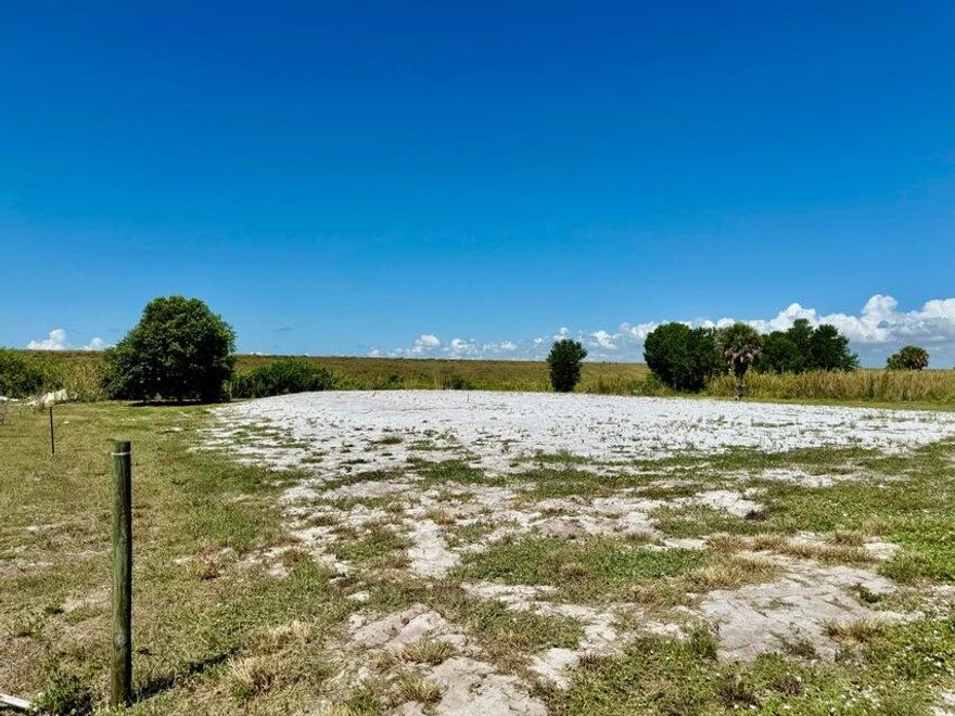 ONE ACRE ~ on RIM CANAL - LAKE ''O'' Access!  Build your DREAM HOME! Hurry! Land is cleared.  170 loads of dirt has been added for house pad foundation. Includes Survey, perk test and soil test. Only minutes to Publix and Home Depot.  Fantastic location for your FOREVER Home!  GRACIOUS WATER VIEWS!

Dimensions are approximate, must measure for exact.