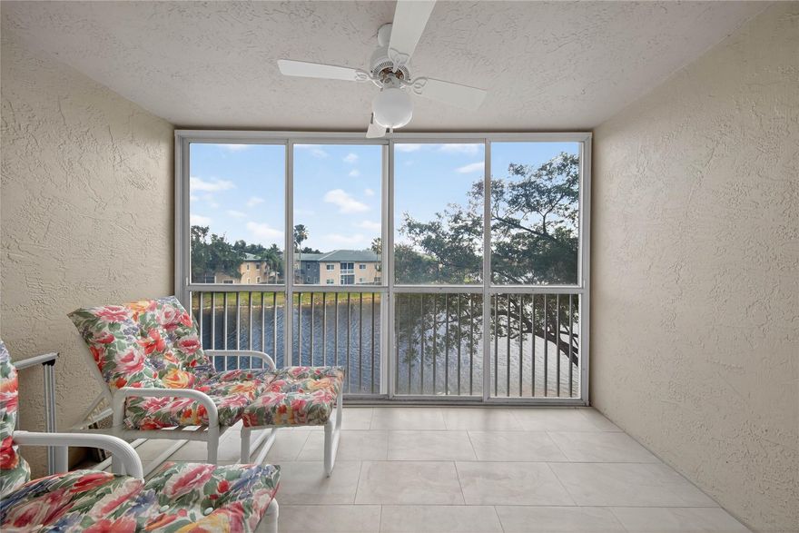 Beautifully maintained 2BR/2BA condo with stunning water views from the main living areas and primary suite, located in the secure, 55+ gated community of Trent in Kings Point. The kitchen opens up & flows seamlessly into a bright and spacious living area featuring neutral tile flooring throughout. The oversized primary suite offers tranquil lake views, a generous walk-in closet, and a private en-suite bath. Relax on the large screened-in balcony with tile floors and expansive water views—perfect for morning coffee or evening sunsets. Washer & Dryer in unit. Kings Point offers resort-style amenities including an indoor & outdoor pool, state-of-the-art fitness center, theater, clubhouse, billiards, tennis, spa, and shuttle service. Cable & internet included in HOA fees. No leasing allowed.