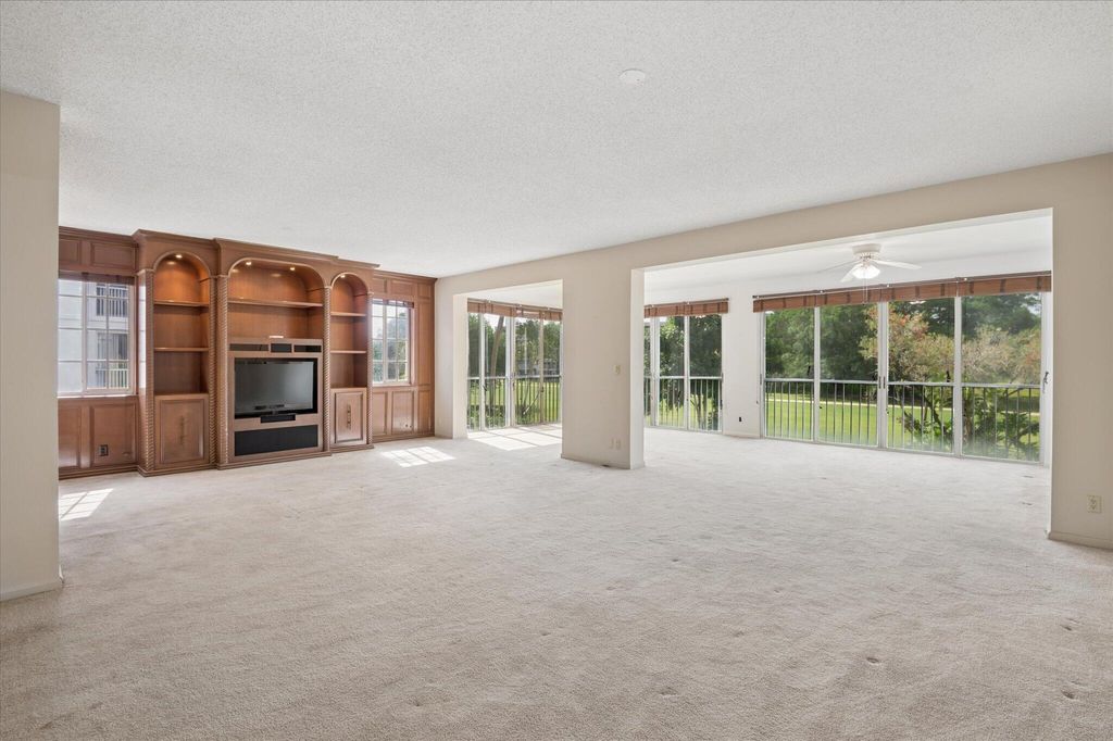 Photo of 4112 W Palm Aire Drive #122a, Pompano Beach, FL 33069 (MLS # B26033633)