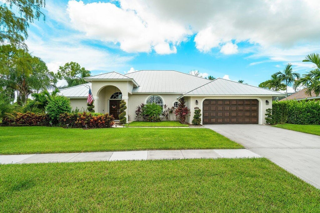Photo of 13514 NORTHUMBERLAND Circle, Wellington, FL 33414 (MLS # B26079124)