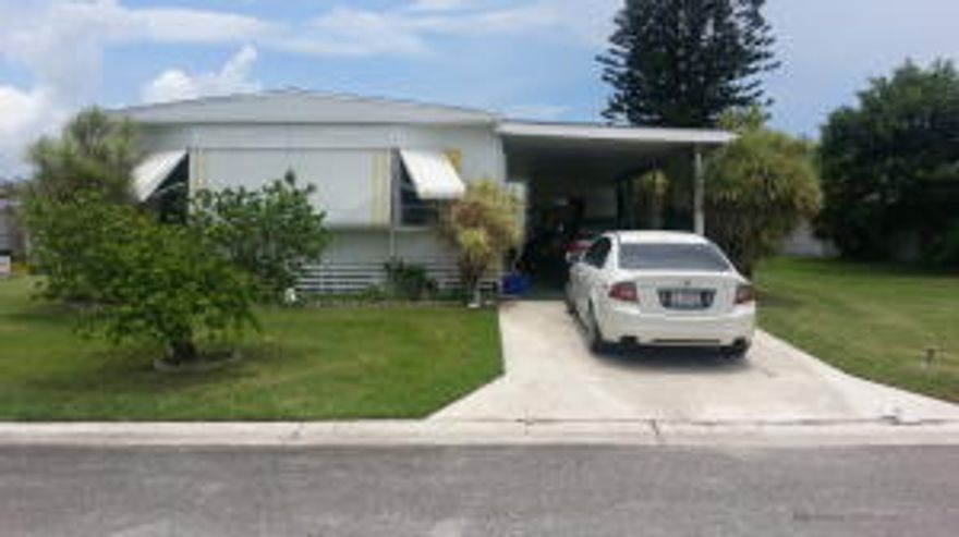 double wide in very good condition, well maintained walk to club house. large 8x10 shed with washer/dryer. , patio out back carport,large family room eat in kitchen