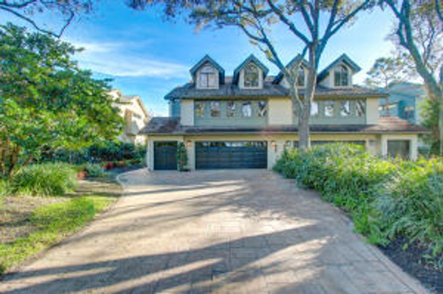 Amazing Golf Course Townhome w/spectacular water and golf views.  New kitchen renovation, Brazilian hardwood floors, newer carpet and fresh paint.  Can be purchased fully furnished!  Easy 3 floor living with private elevator.