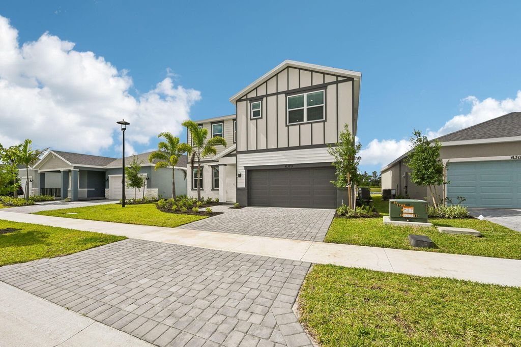 Photo of 6320 NW Cloverdale Avenue, Port Saint Lucie, FL 34987 (MLS # R11121071)