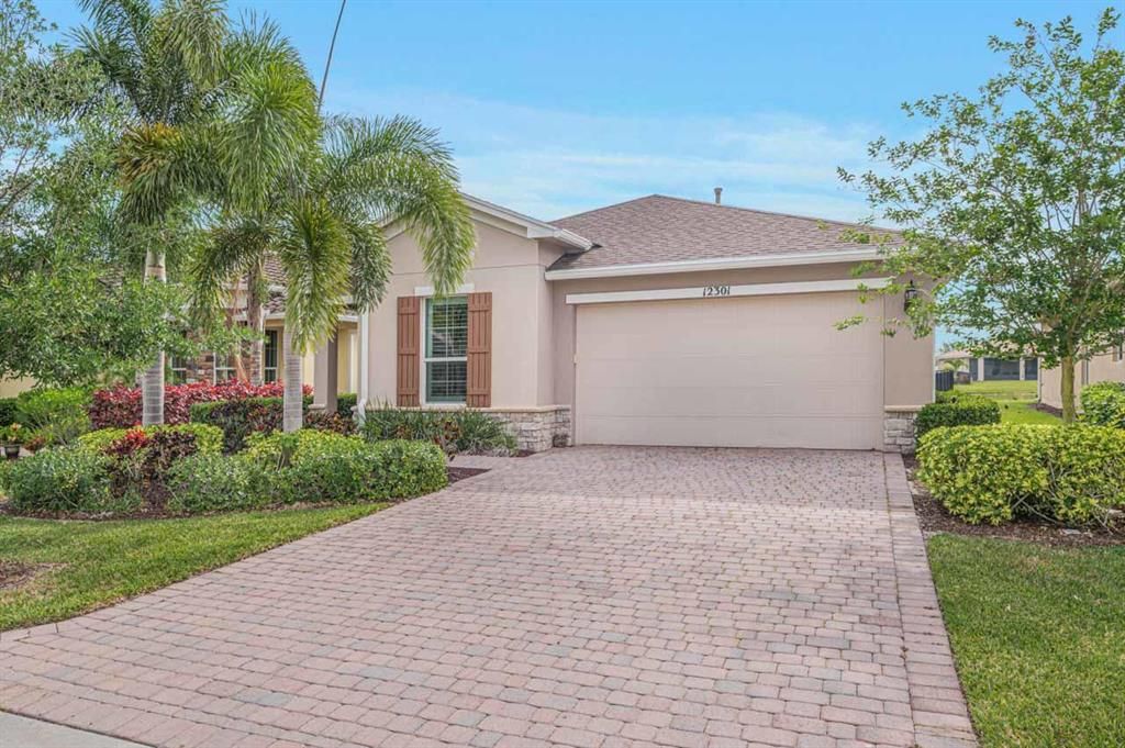 Photo of 12301 SW Weeping Willow Avenue, Port Saint Lucie, FL 34987 (MLS # R10708076)