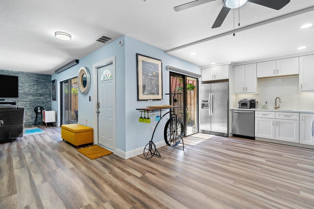 Photo of 3211 Gardens East Drive #A, Palm Beach Gardens, FL 33410 (MLS # R11094063)