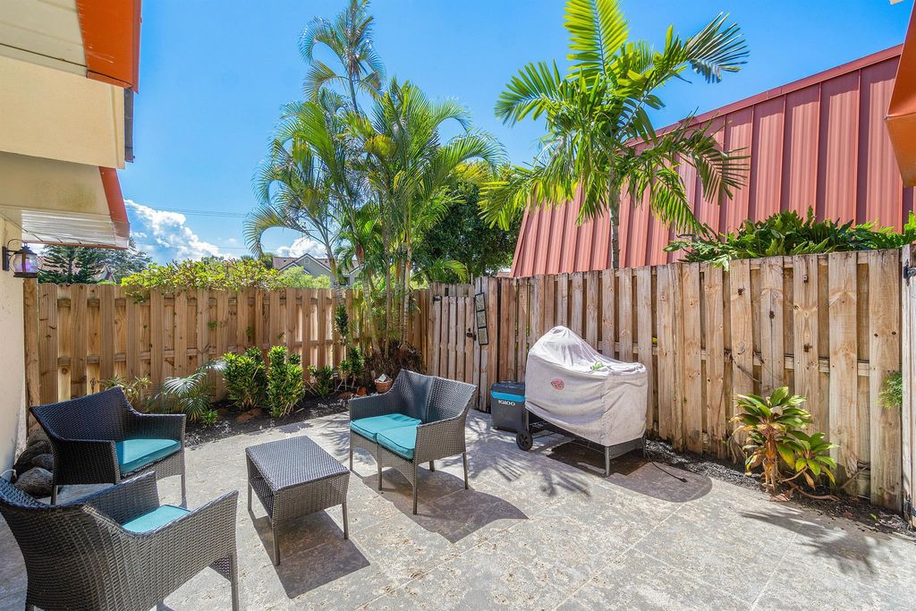 Photo of 3211 Gardens East Drive #A, Palm Beach Gardens, FL 33410 (MLS # R11094063)