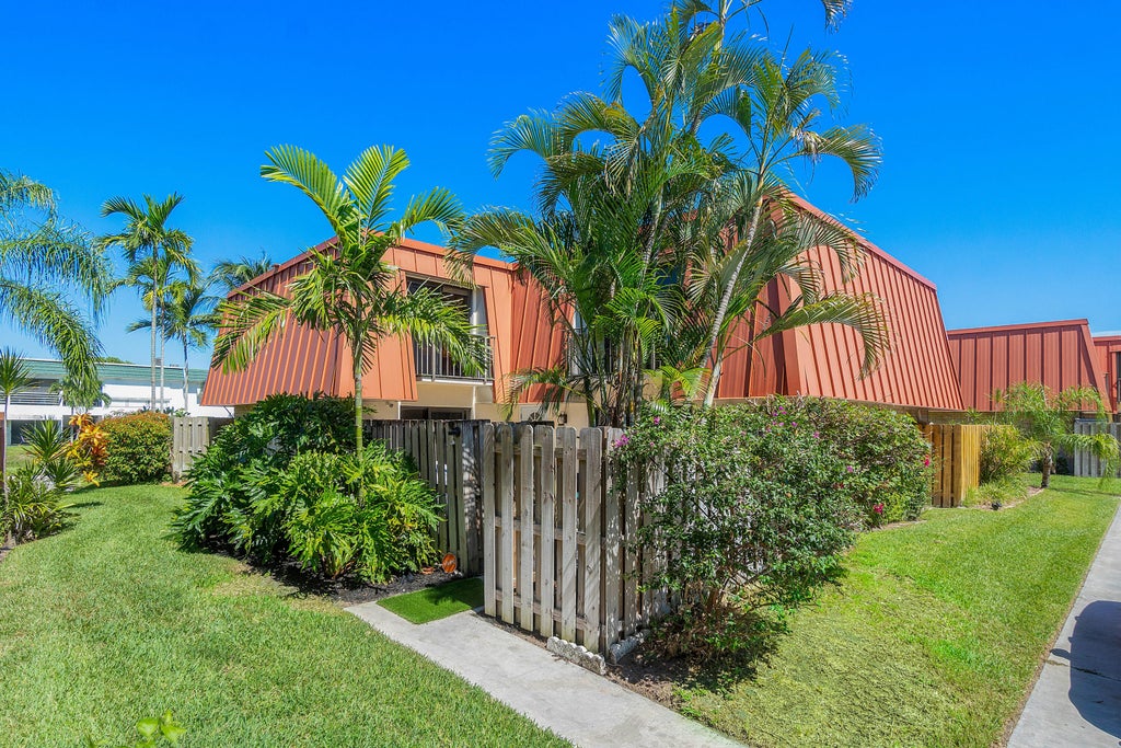 Photo of 3211 Gardens East Drive #A, Palm Beach Gardens, FL 33410 (MLS # R11094063)