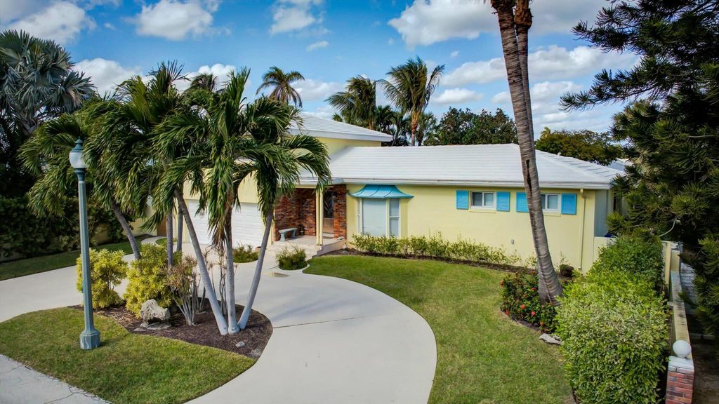 Photo of 207 Blossom Lane, Palm Beach Shores, FL 33404 (MLS # R11046160)