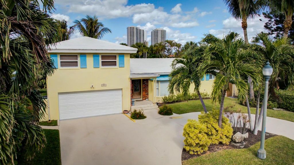 Photo of 207 Blossom Lane, Palm Beach Shores, FL 33404 (MLS # R11046160)