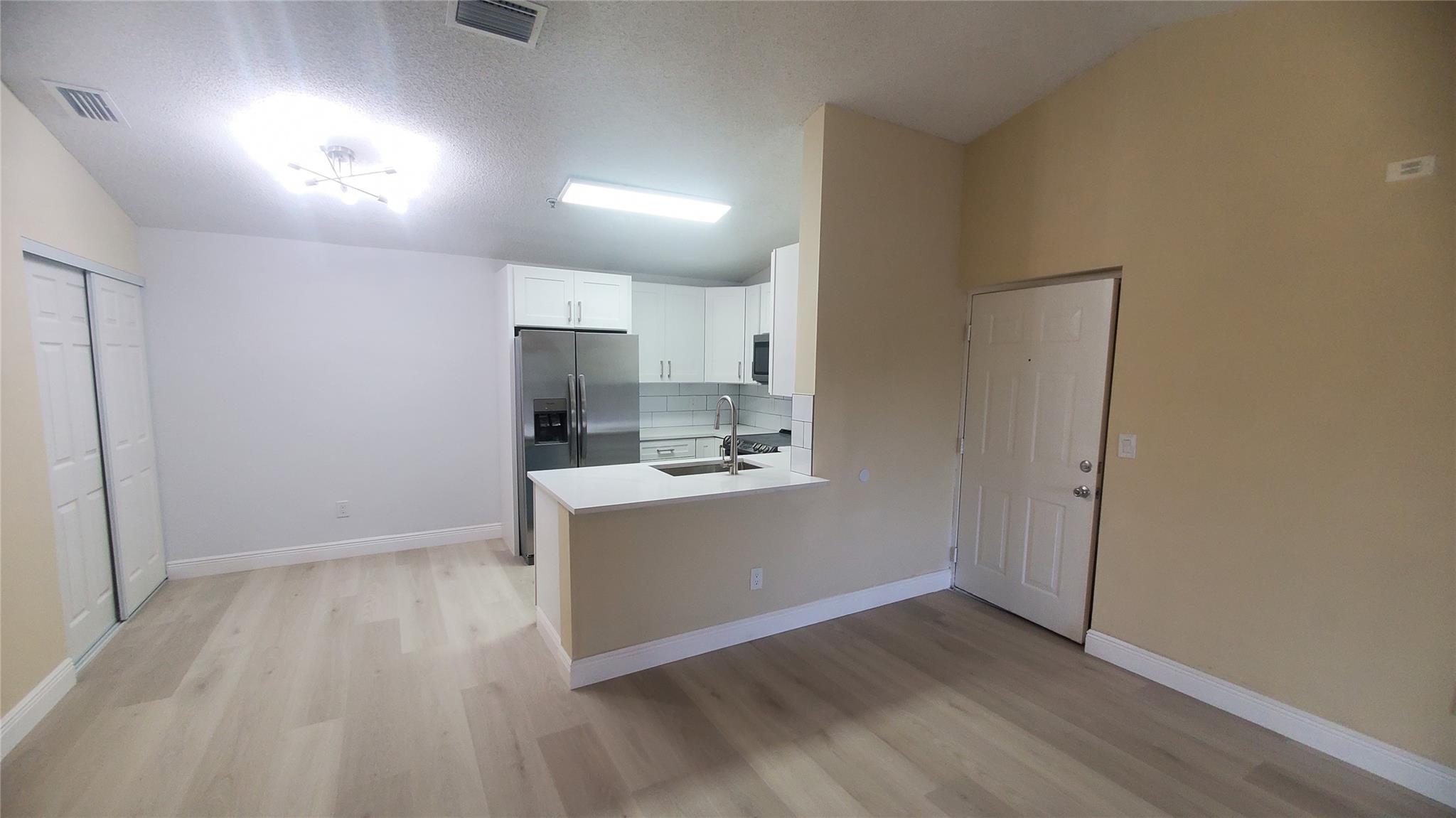 ***THIS UNIT JUST GOT RENOVATED & AVAILABLE TO RENT. FEATURES BRAND NEW KITCHEN & APPLIANCES, NEW BATHROOM VANITY & TOILET, NEW FLOORS & LIGHTING FIXTURES, FRESHLY PAINTED. THIS IS A SPACIOUS 2/1 CORNER UNIT IN CLUB CARIBE W/ A FULL SIZE WASHER & DRYER. HAS GREAT HIGHWAY ACCESS & A CENTRAL LOCATION. READY TO MOVE IN.***GATED COMMUNITY OFFERING AMENITIES TO RESIDENTS SUCH AS RESORT STYLE SWIMMING POOL & HOT TUB, TENNIS COURT/BASKETBALL COURTS, FITNESS CENTER & A WONDERFUL KID'S PLAYGROUND! NO PETS IN THIS UNIT PLEASE, I AM SORRY. ***A MUST SEE UNIT!!!