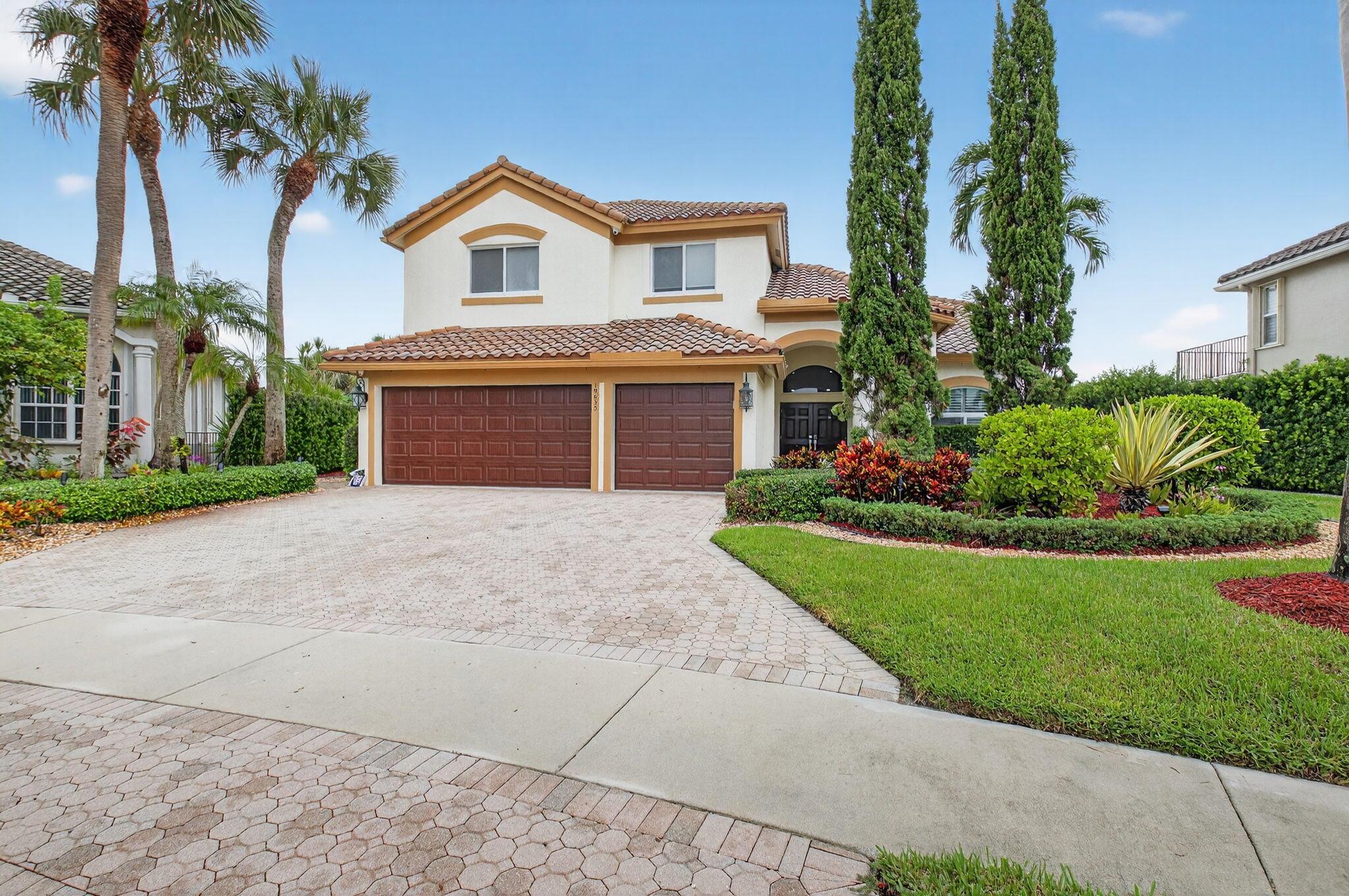 YOUR DREAM HOME IS FINALLY HERE!!! No stone was left unturned in this completely updated, lakefront 4 bedroom/3 bathroom/3 car garage home located on a cul-de-sac in the highly desirable gated community of Boca Isles South. This magnificent home has a whole house generator and impact glass throughout. Updated kitchen has marble countertops, soft-close cabinets, newer Bosch refrigerator and dishwasher, Wolf gas stove. The garage has custom built-ins, new epoxy flooring and air conditioning. Low HOA fees include 24/7 manned gate, security patrol, on site property manager and cable/wifi. Community amenities include a heated pool, hot tub, basketball, tennis, pickleball, sauna, movie theater, billiard room and fitness center. Zoned for A rated schools. KEY UPGRADES: