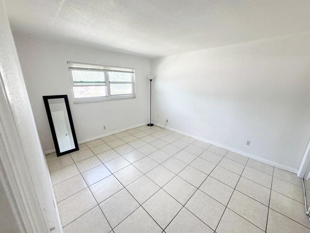 PALMS AT DANIA BEACH COND - Residential Lease