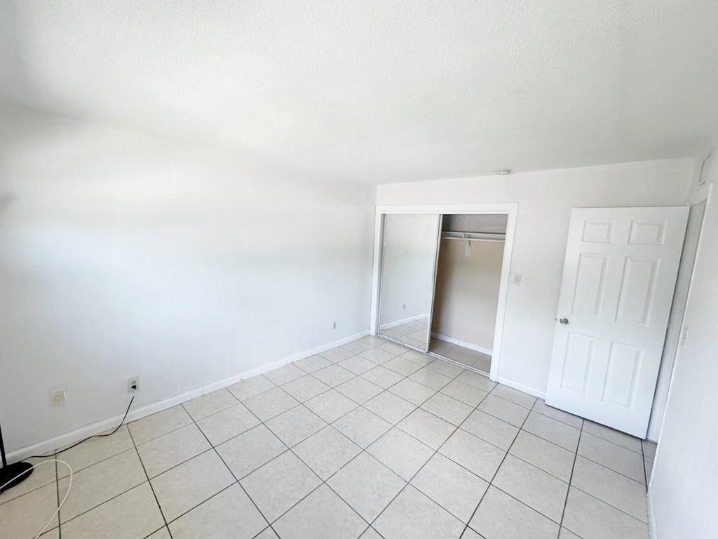 PALMS AT DANIA BEACH COND - Residential Lease