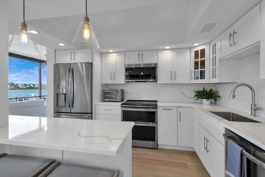 Photo of 1648 Jupiter Cove Drive, Jupiter, FL 33469 (MLS # B26030356)