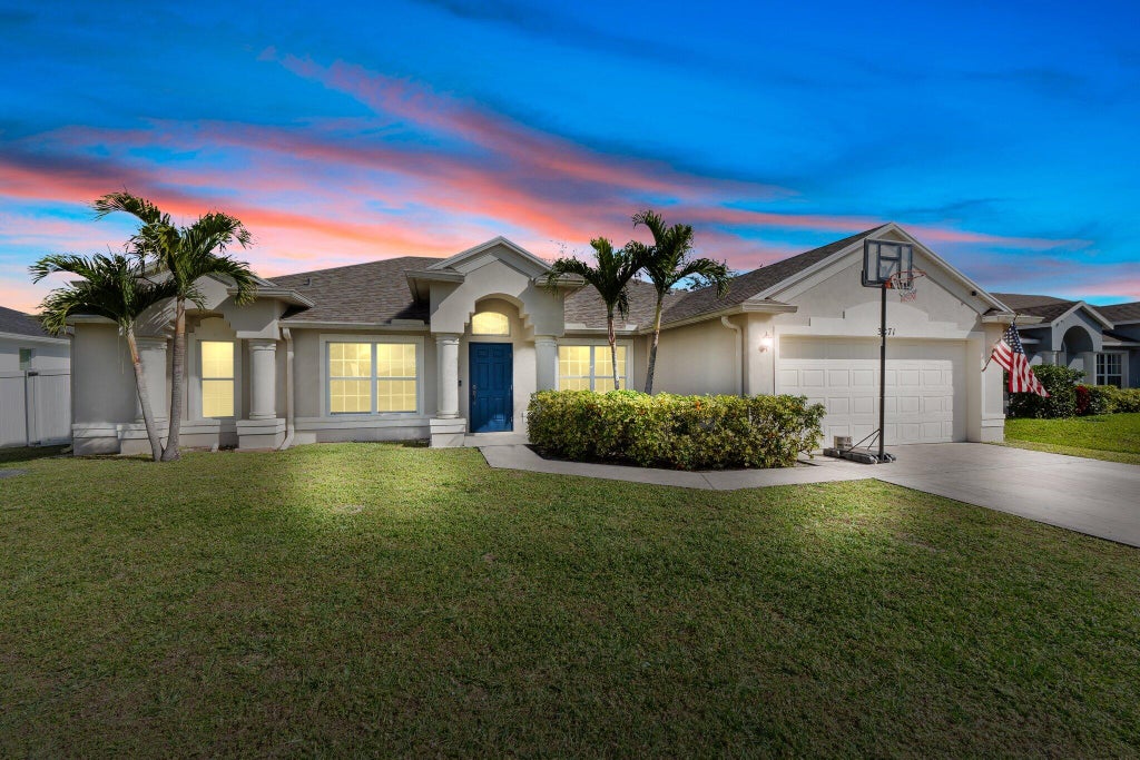 Photo of 3871 SW Ridley Street, Port Saint Lucie, FL 34953 (MLS # R11052040)