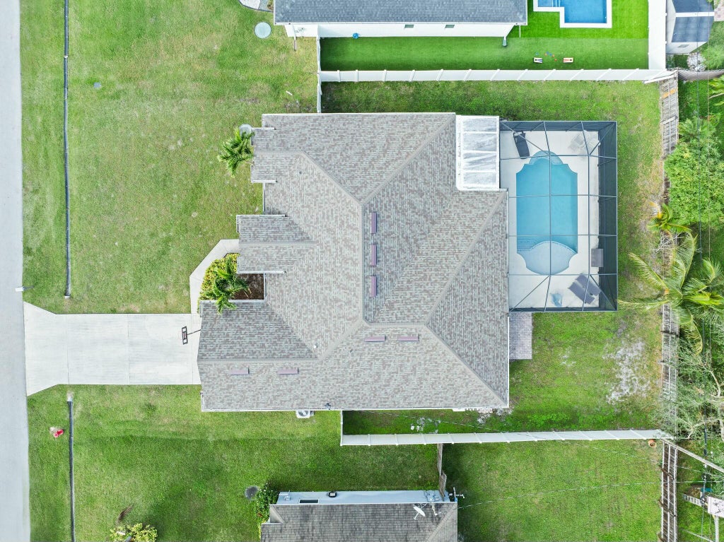 Photo of 3871 SW Ridley Street, Port Saint Lucie, FL 34953 (MLS # R11052040)