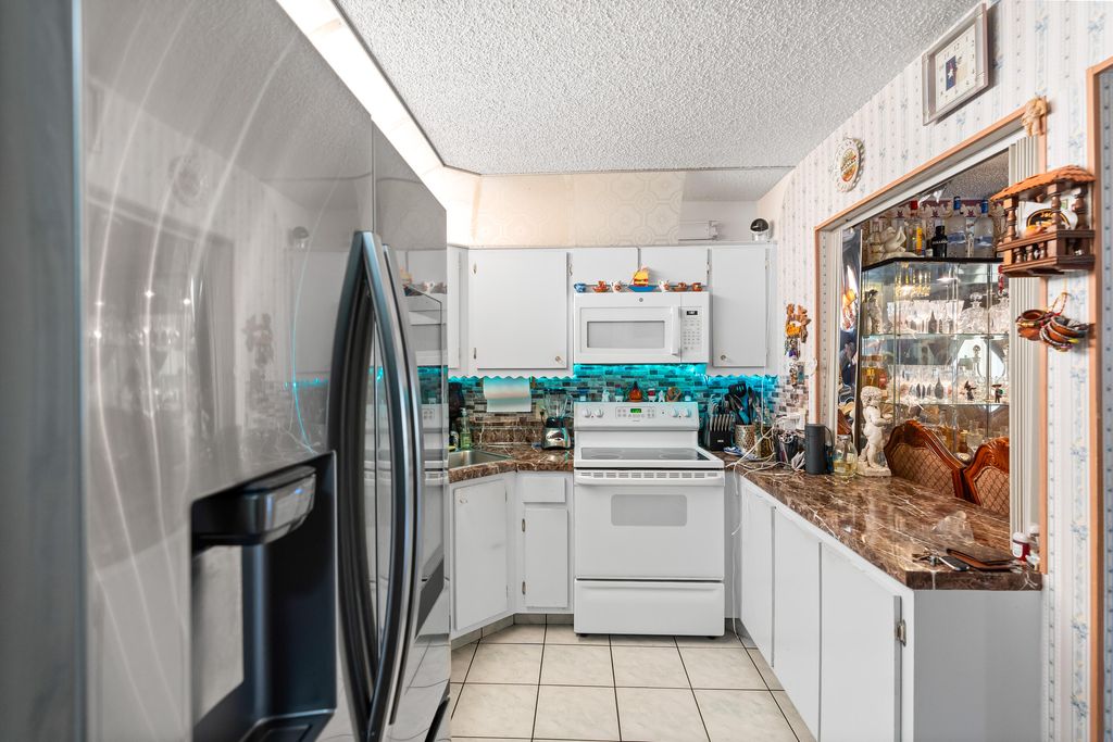 Photo of 4996 Sable Pine Circle #A1, West Palm Beach, FL 33417 (MLS # B26029459)