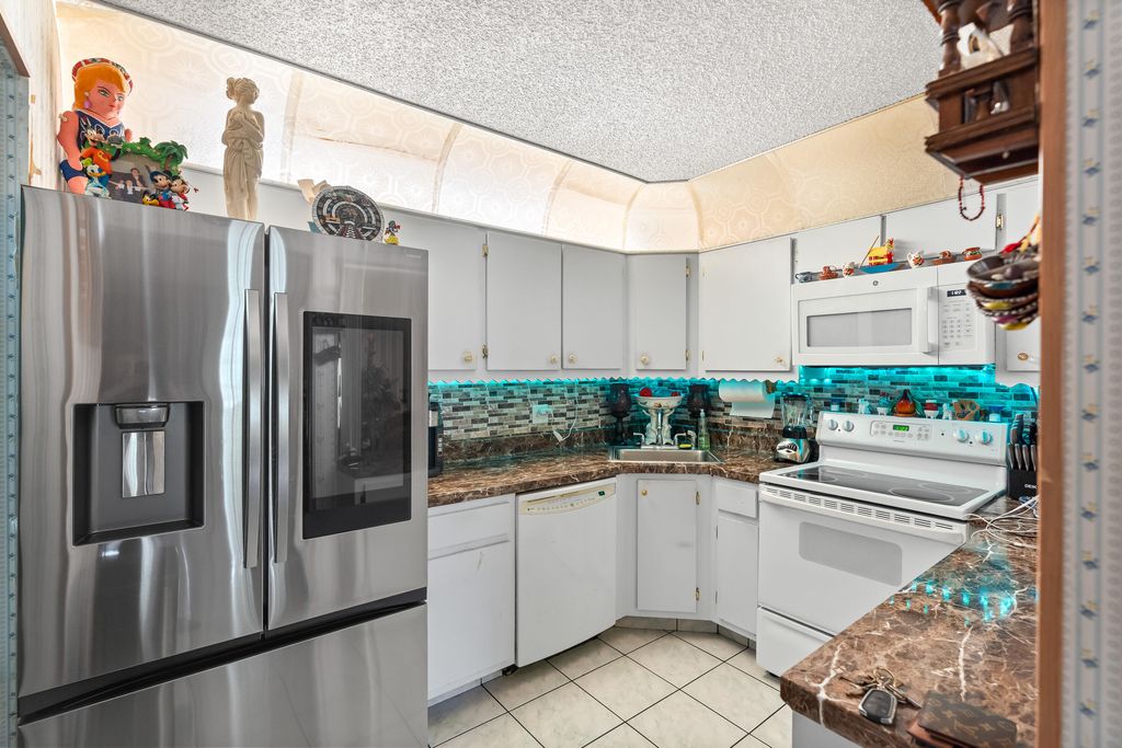 Photo of 4996 Sable Pine Circle #A1, West Palm Beach, FL 33417 (MLS # B26029459)