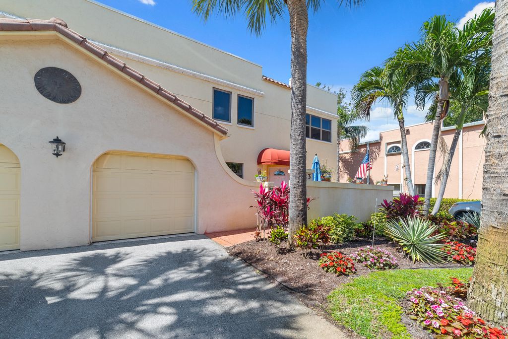 Photo of 83 Uno Lago Drive, Juno Beach, FL 33408 (MLS # R10963690)