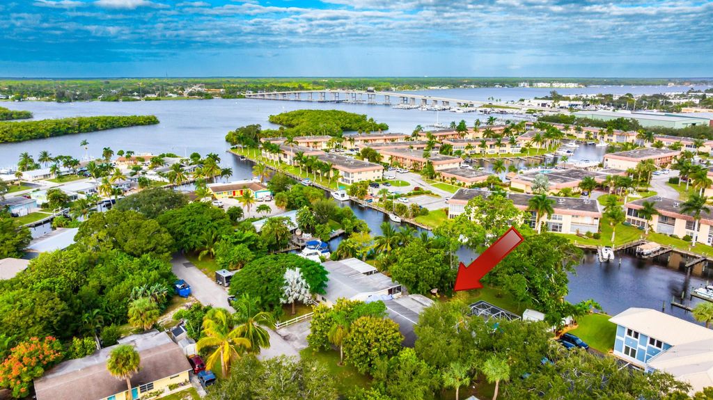 Photo of 2495 SW Hideaway Lane, Stuart, FL 34994 (MLS # R10932646)