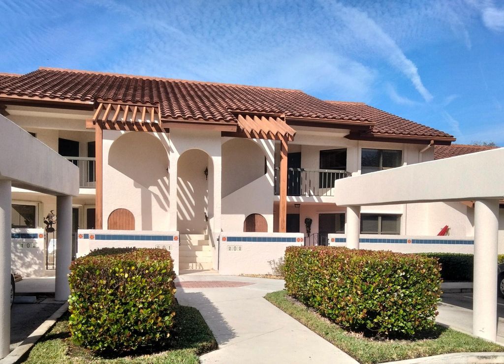 Photo of 6060 SE Martinique Drive #Bld 8 Apt 202, Stuart, FL 34997 (MLS # R10967091)