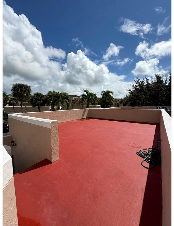 You'll love this updated condo in Boca Pointe. All ages, laundry room inside and incredible rooftop patio! Bonus - private enclosed garage. Unit is on the 2nd floor with peaceful views.